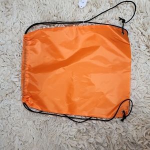Orange drawstring bag